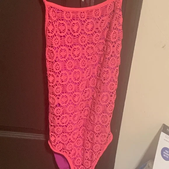 This is a size 14-16 swimsuit one piece crochet detail it’s cute and appropriate - Picture 2 of 2